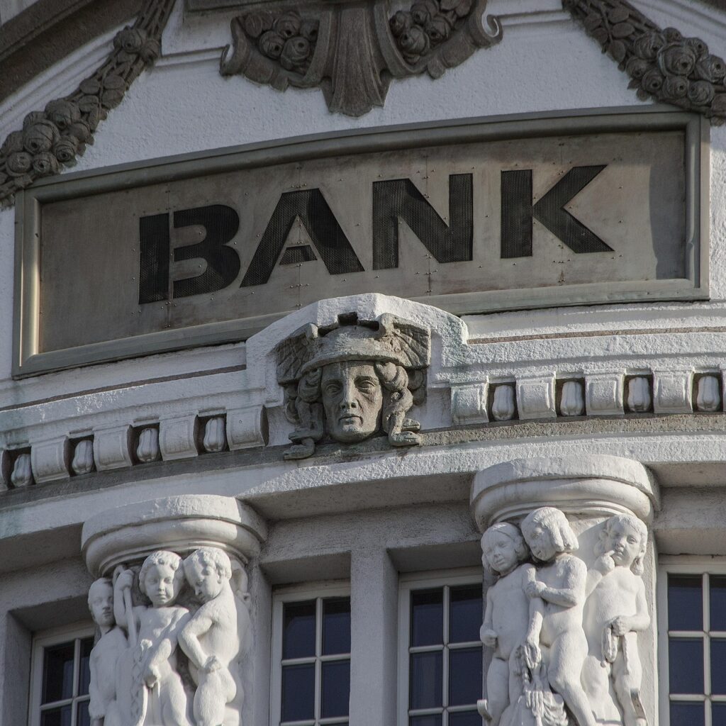 An ornate building with the word βBANKβ etched into it