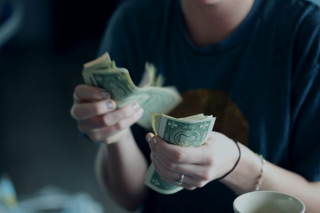 Person Handling Cash