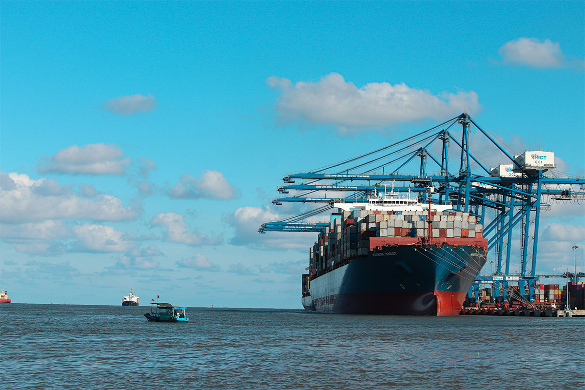 Large cargo ship docked in port